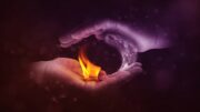 Image of two hands holding fire and water representing the anima and animus