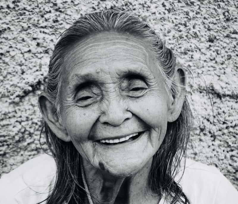 Image of a happy old woman smiling authentically