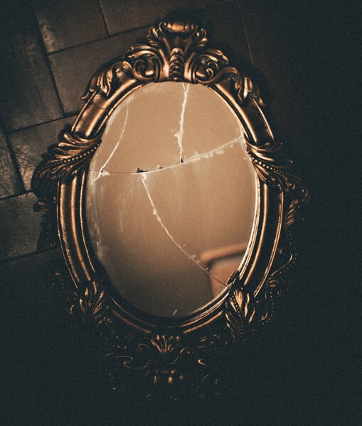 Image of a broken mirror symbolic of having a sense of entitlement