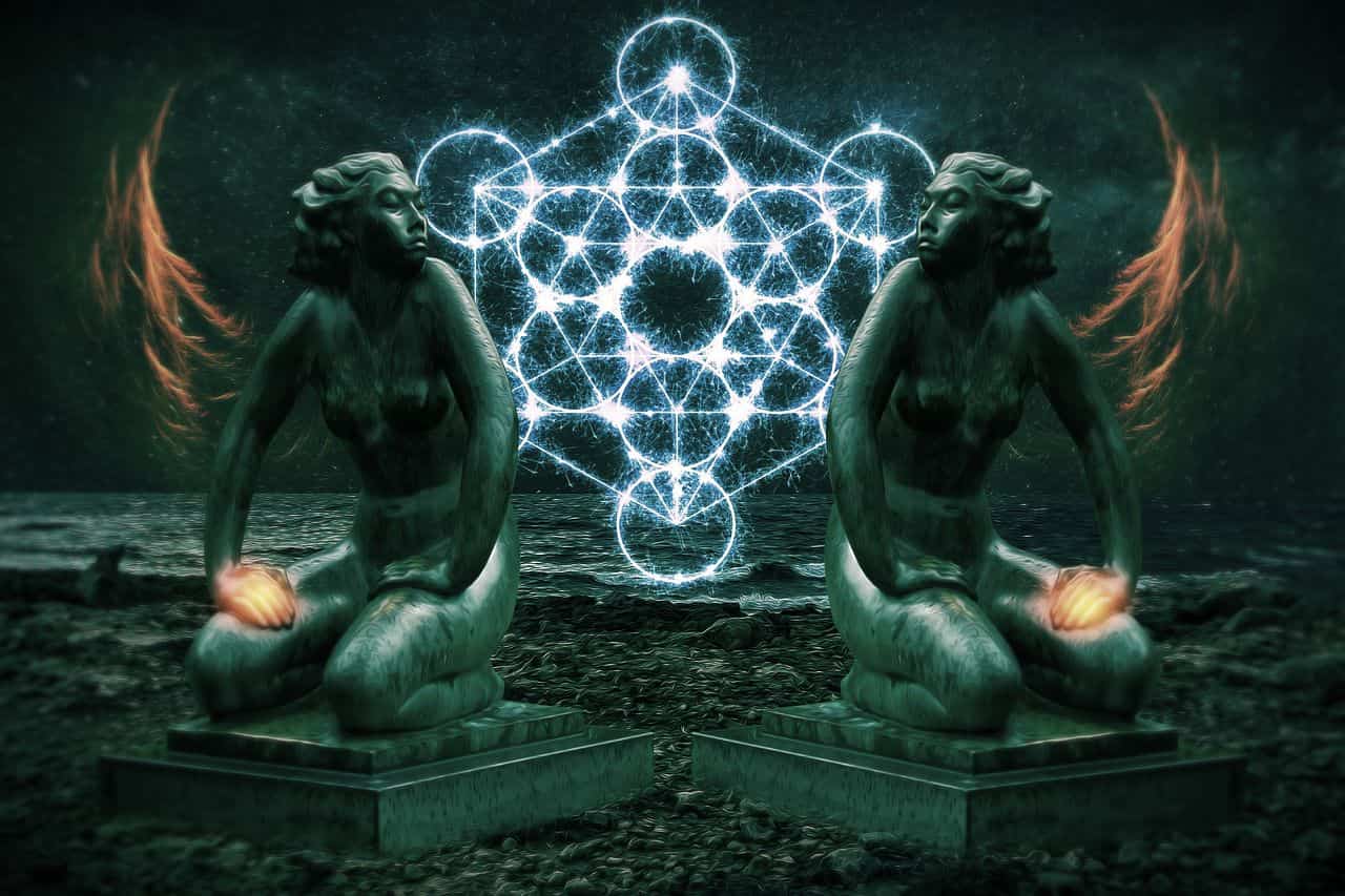 Image of a mystical spiritual alchemy symbol and two statues