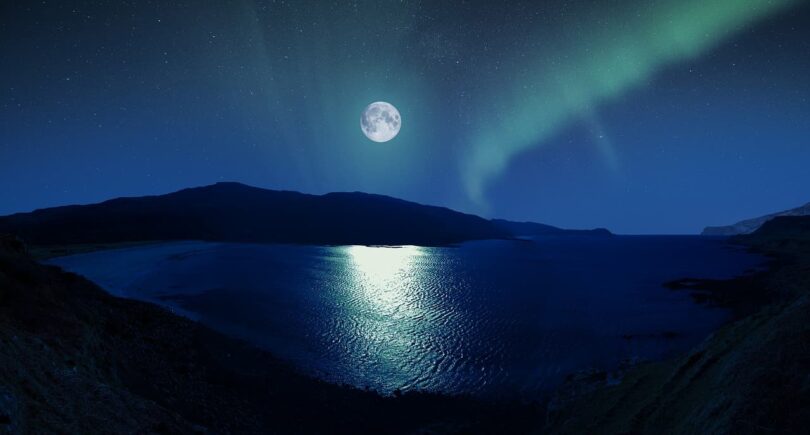 Image of a moon over the water that symbolizes individuation