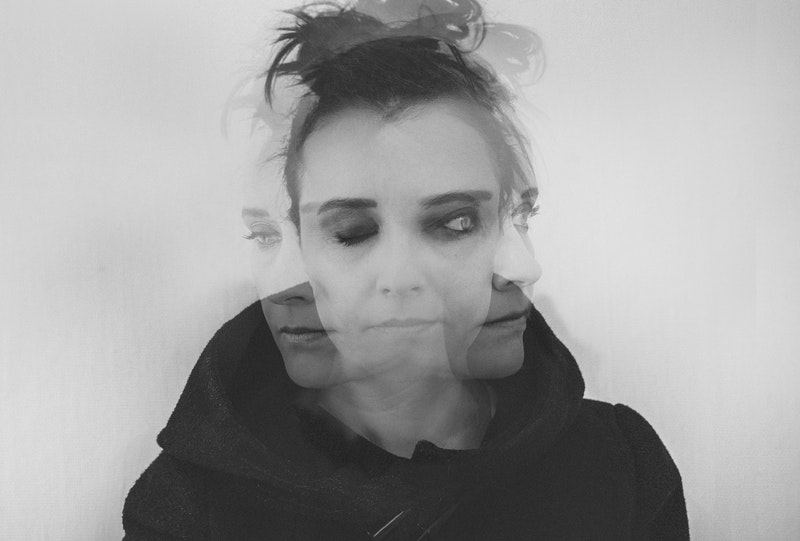 Image of a double exposure woman suffering from soul loss