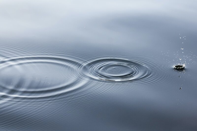 Image of water droplets rippling outward