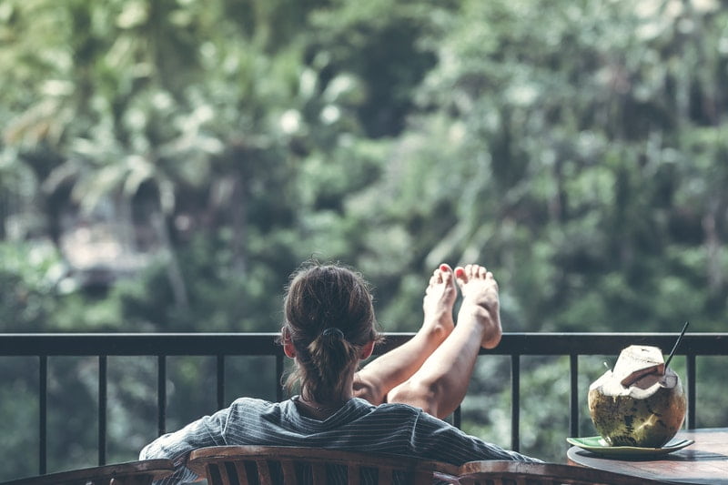 Image of a person sitting and relaxing