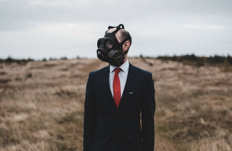 Image of a man wearing a gas mask