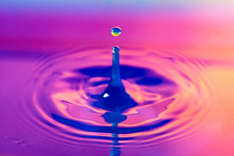 Image of a water dropping into a pink pond representing how to be true to yourself