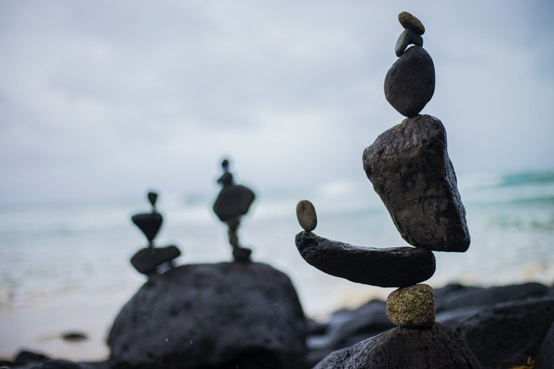 Image of zen beach stones stacked on top of each other