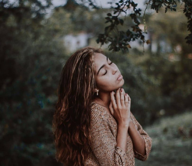 Image of a woman practicing self-love