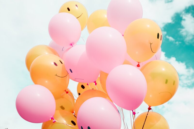 Image of sad and happy balloons symbolic of good vibes only and toxic positivity