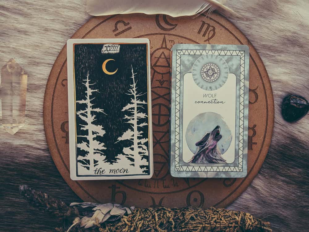 Difference between oracle and tarot decks image