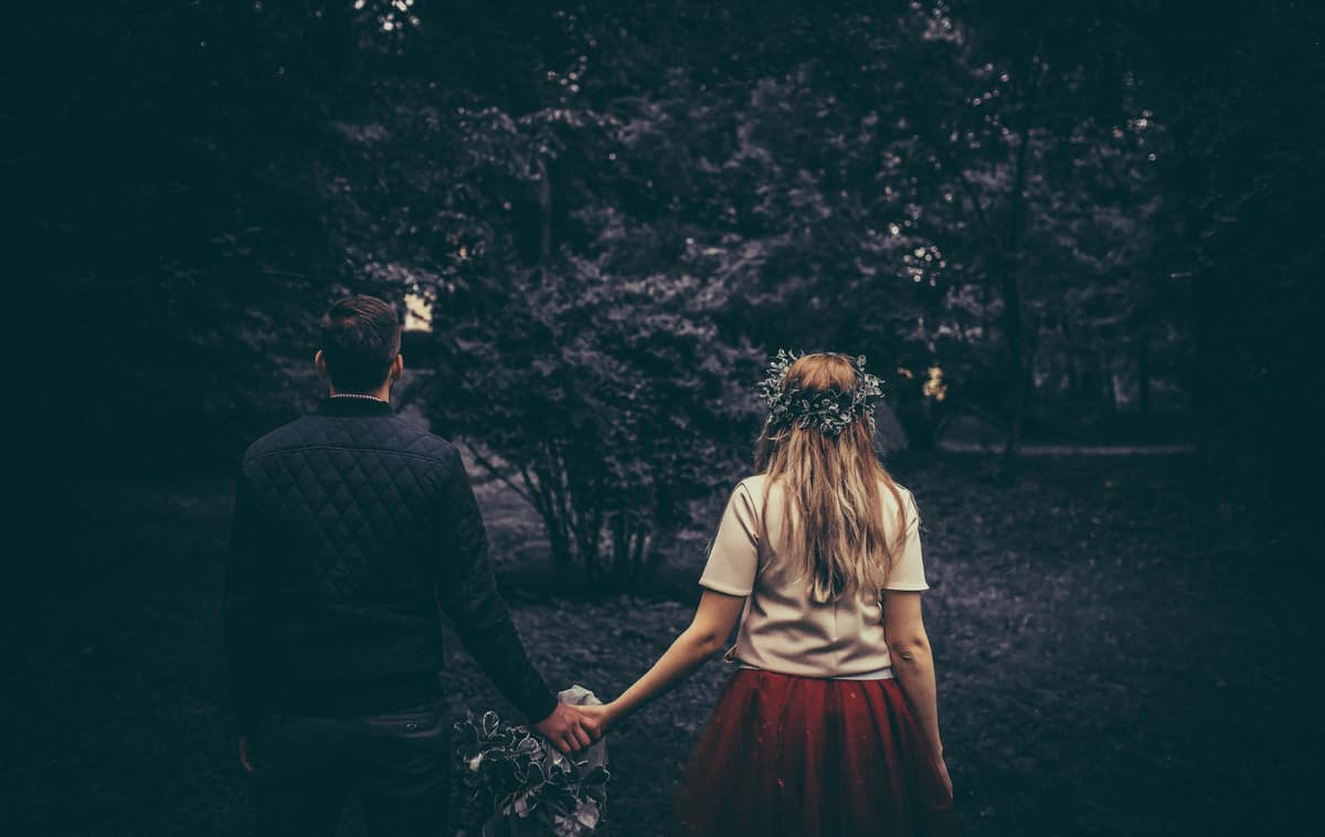 Image of a couple holding hands