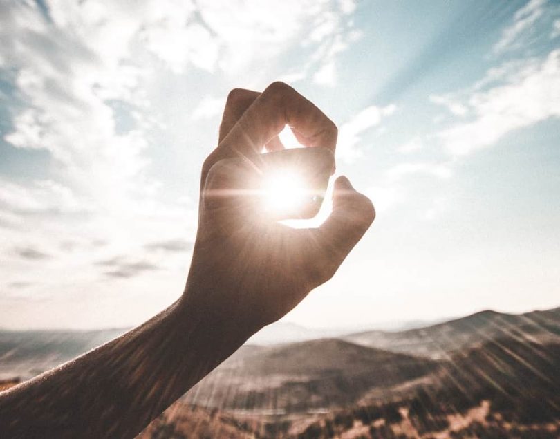 Image of sunlight coming through a hand