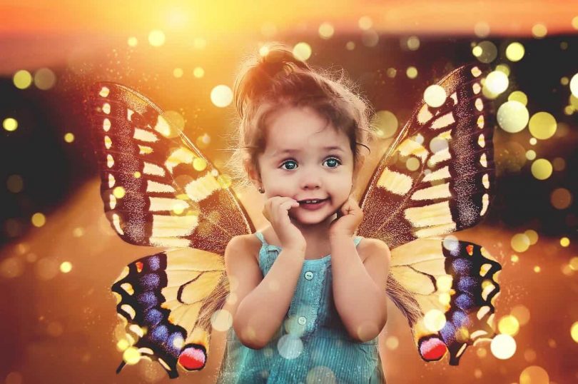 Image of a magical child with butterfly wings