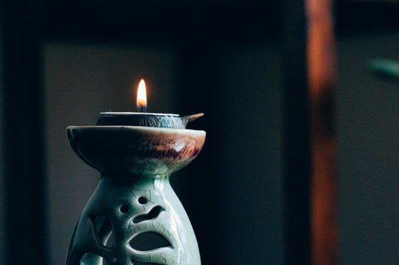 Image of an oil burner and candle