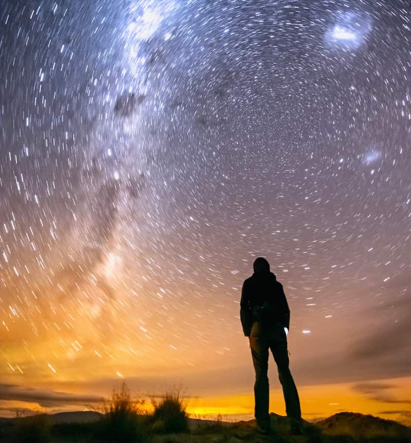 Image of a person gazing up at the milky way