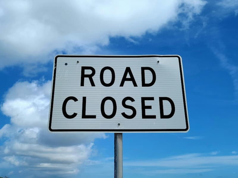 Image of a sign that says "road closed"