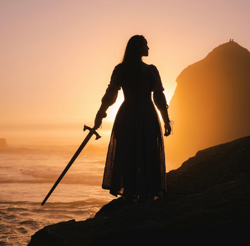Image of a woman wielding a sword of truth