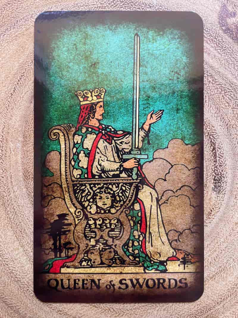 Image of the queen of swords tarot card