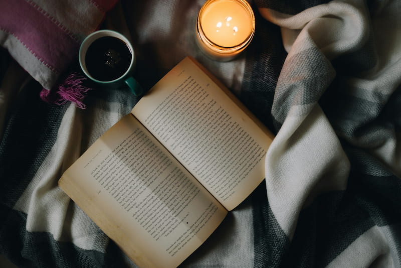 an image of a book and a candle
